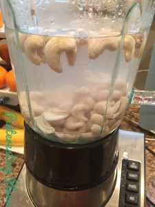 rinse your nuts and toss them in the blender. fill the glass you soaked the nuts in 3-4 times with water and pour it into the blender along with your nuts. blend on high for 1 minute.