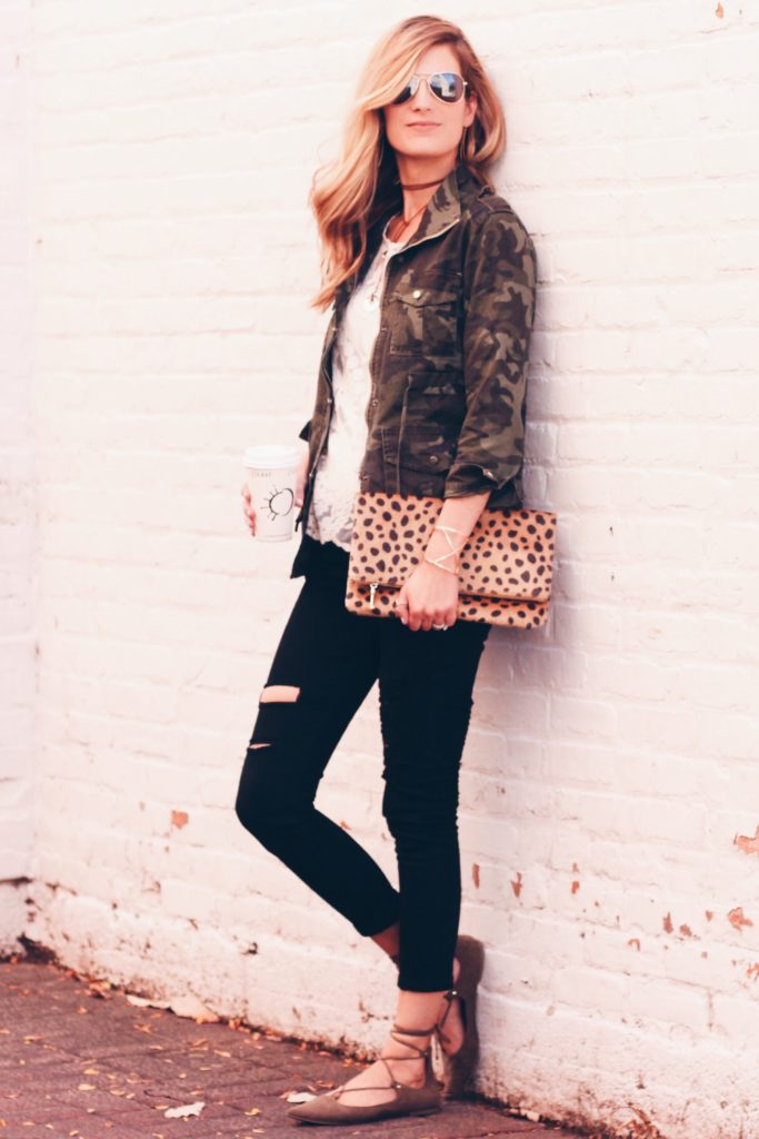 fall outfit black distressed denim and camo jacket
