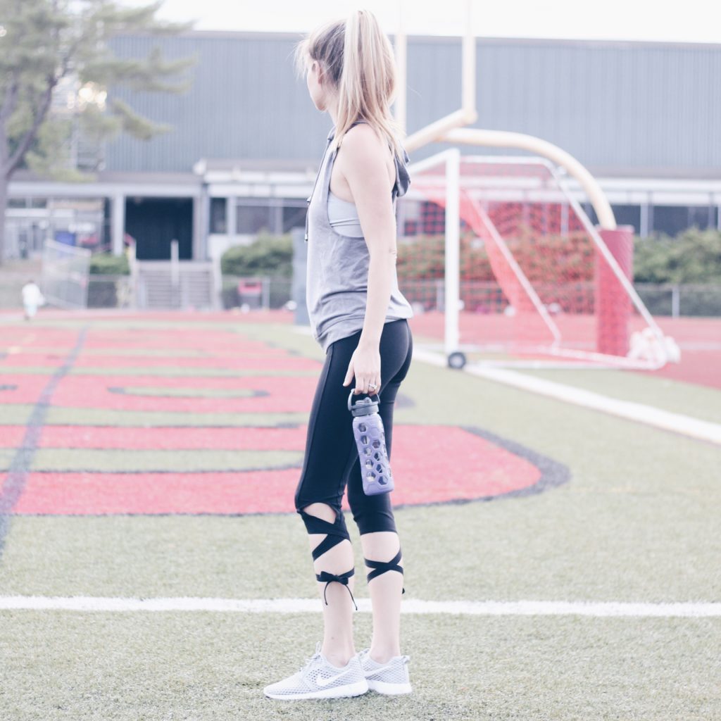 free people lace up leggings and sleeveless hoodie workout outfit