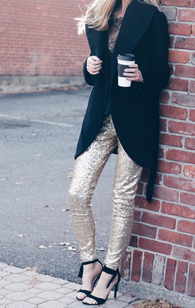 black wrap wool coat over gold sequin leggings