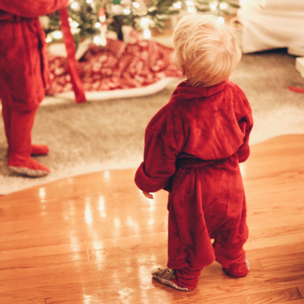 small child in christmas robe