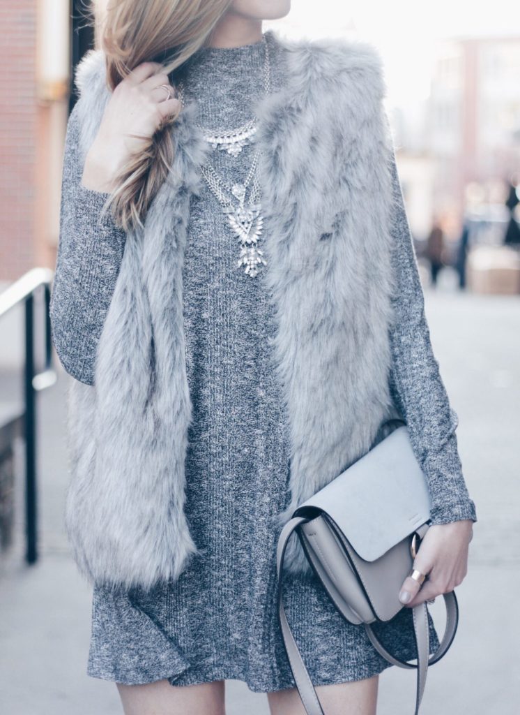 gray fur vest and bib necklace