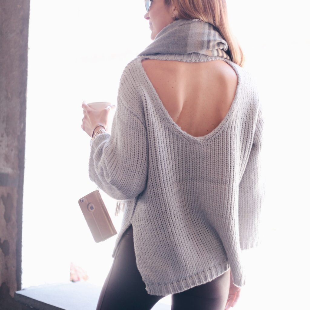 open back sweater and plaid scarf