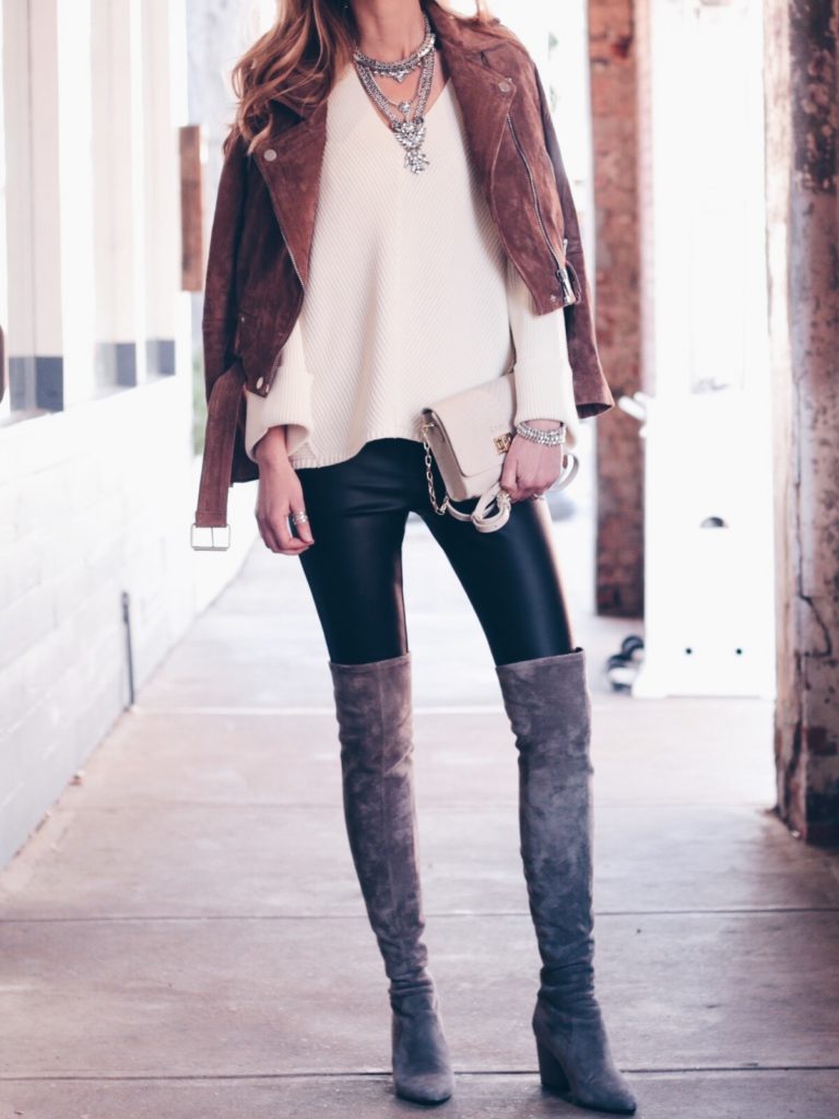 leather leggings outfit with suede over the knee boots and white free people sweate road moto jacket