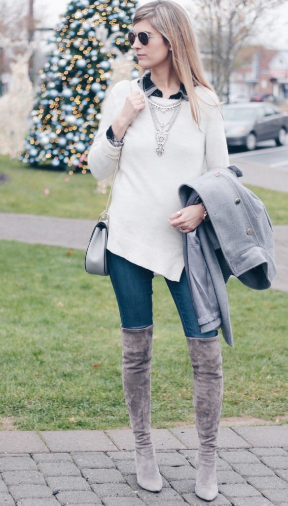 white lilla p crewneck sweater with denim and over the knee boots
