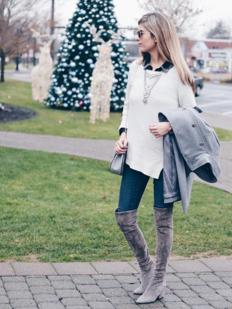 women's winter outfit: leggings and suede over the knee boots with layered sweater and gray military coat