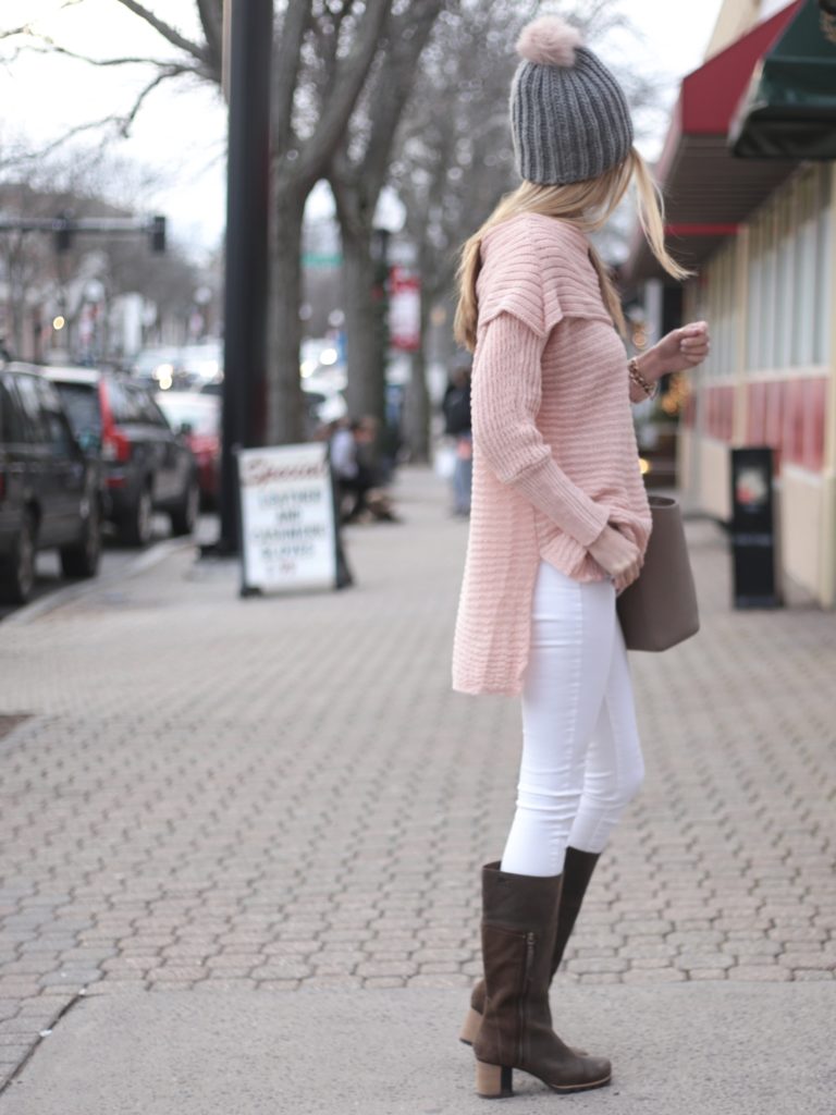 winter outfit: pink off the shoulder sweater with white skinny jeans and known knee high boots
