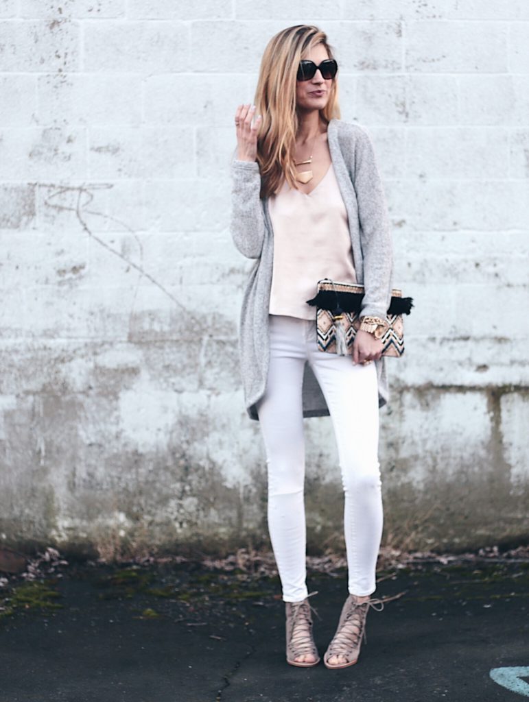 spring outfit: blush pink satin cami with gray long cardigan, white skinny jeans, and Jefferey Campbell lace up taupe peep toe booties