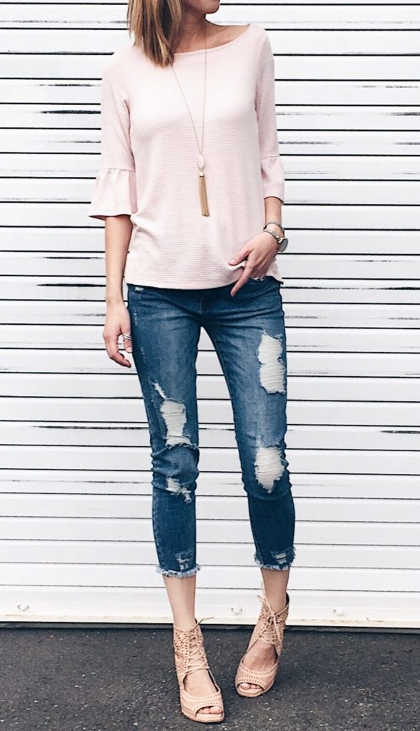 Connecticut life and style blogger, Pinteresting Plans shares a round-up of spring outfit ideas that she showcased on her Instagram. spring outfit idea: pink ruffle sleeve top with distressed cropped denim and wedges