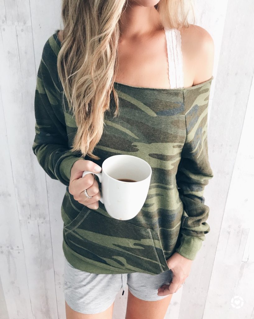 his and her athleisure wear - pinterestingplans in off the shoulder camo sweatshirt and lace bralette