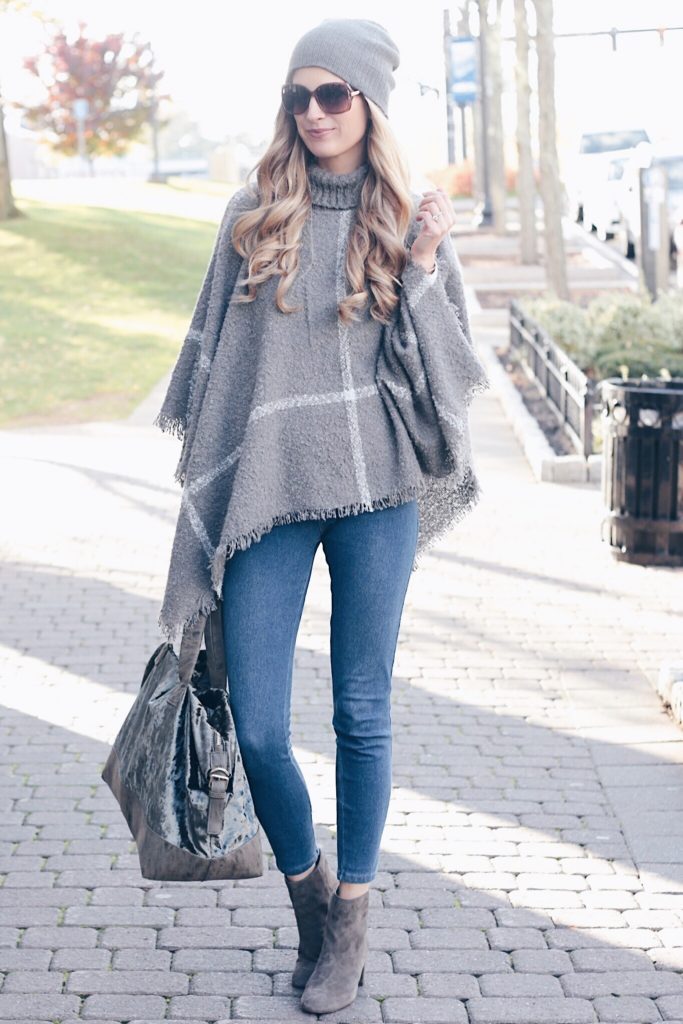holiday airport outfits - turtleneck sweater poncho and denim leggings on pinterestingplans