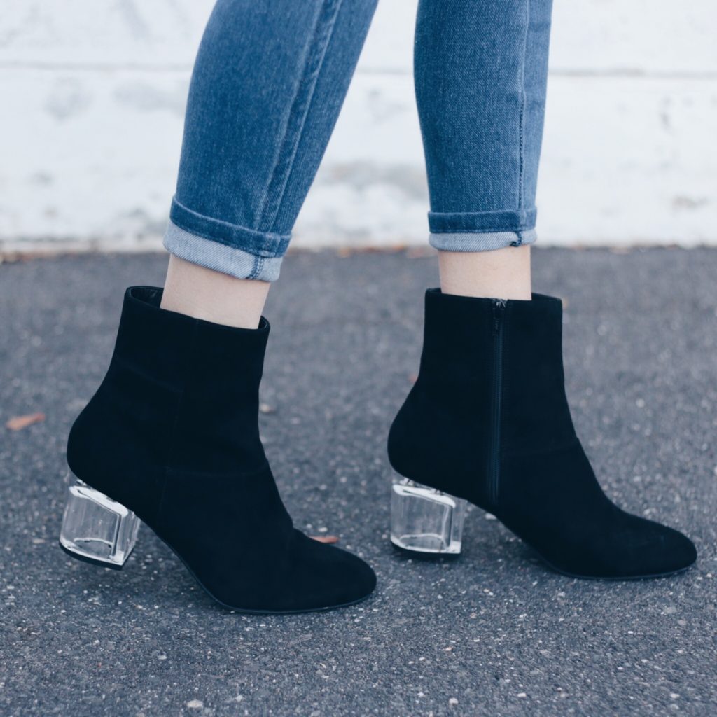 lucite heel black booties for a holiday airport outfits post with sole society