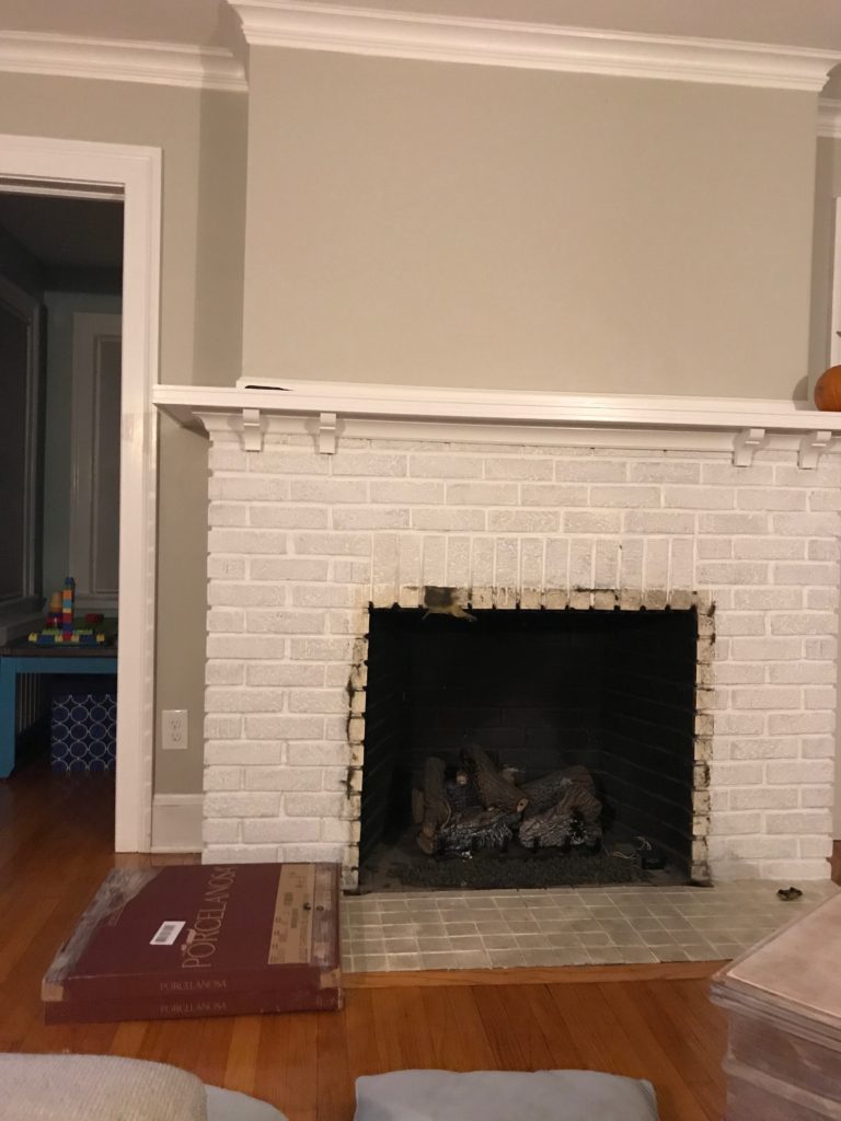 fireplace makeover before and afteer photos - fireplace with glass doors removed