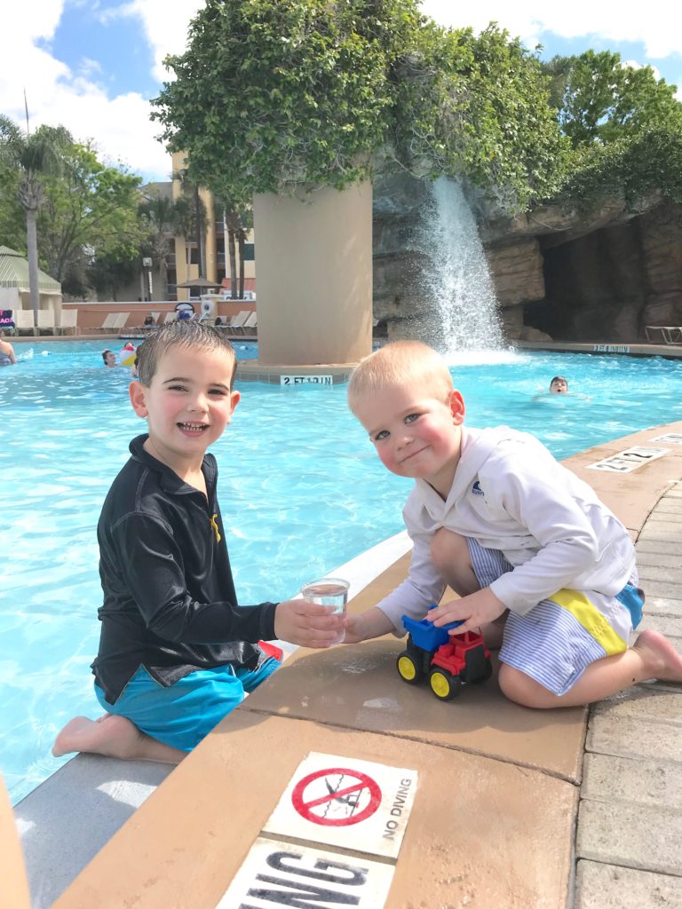 tips for magic kingdom first timers - little boys enjoying a hotel pool