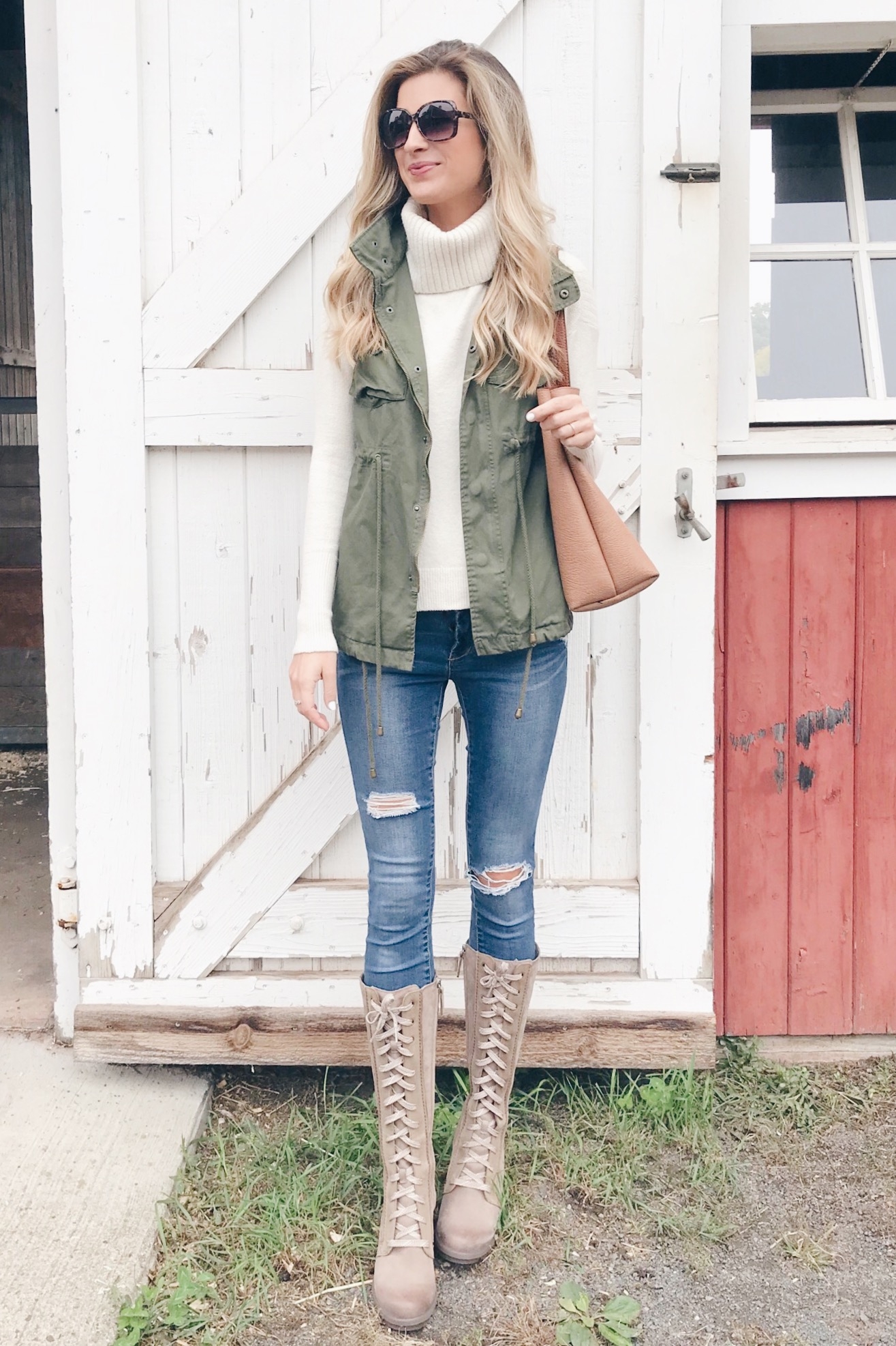 Fall utility vest outfit ideas - paired with a white sweater and jeans on pinteresting plans blog
