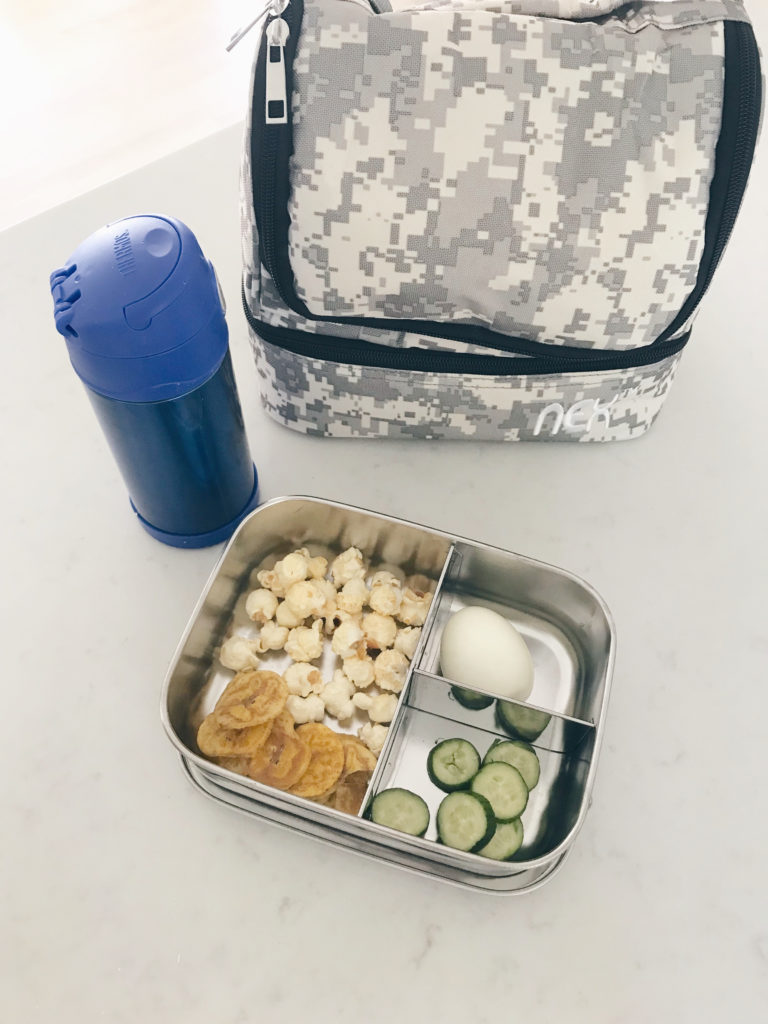 back to school supplies and lunch ideas for picky eaters in a stainless steel bento box