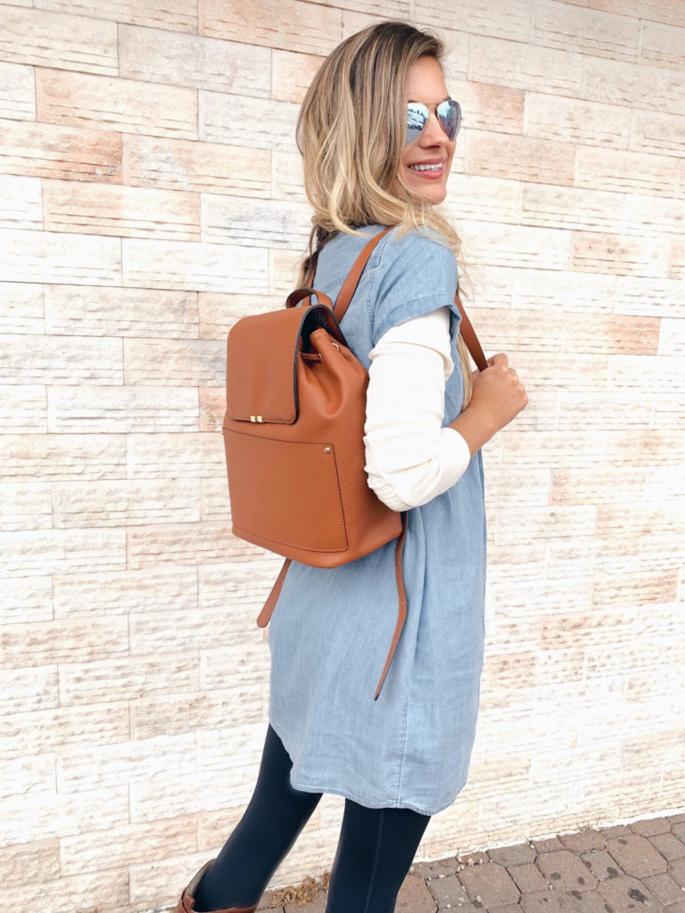 fashion blogger wearing Abercrombie chambray dress layered with free people henley and sole society handbag