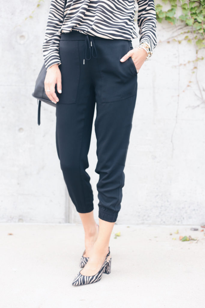 workwear fall fashion trends 2019 - black joggers withh zebra heels pinteresting plans fashion blogger Rachel Moore of connecticut in Ann Taylor