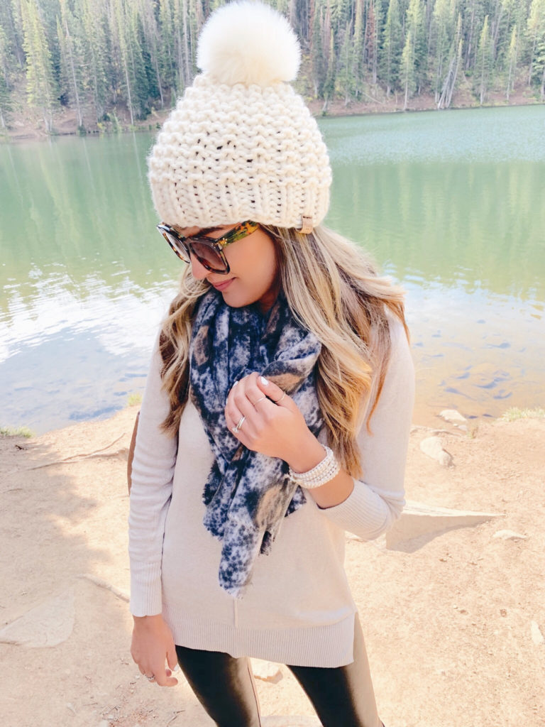 cute fall outfits - pinteresting plans blogger Rachel Moore in tunic sweater with pom beanie and Victoria Emerson wrap bracelet