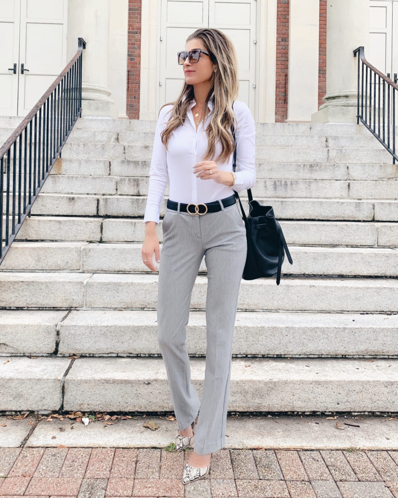 Fashion blogger wearing express business casual mid rise skinny columnist gray pants