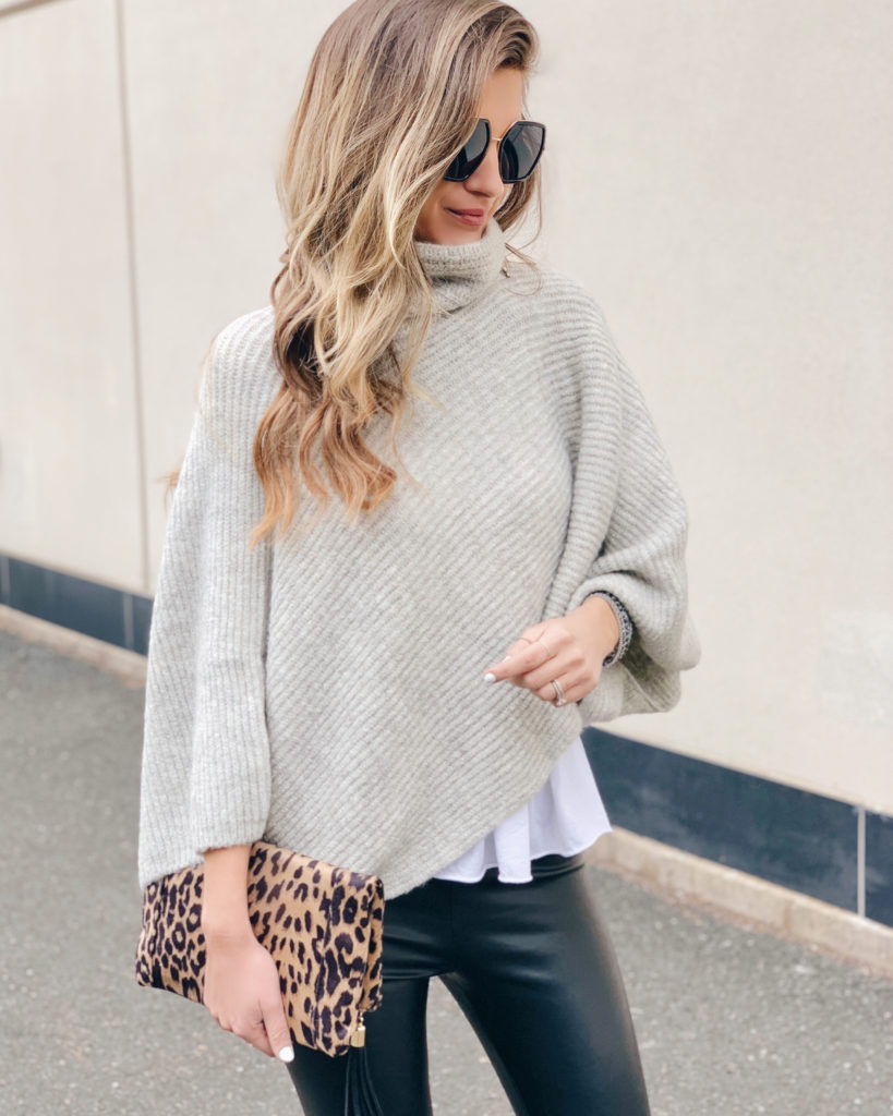 turtleneck cropped knit poncho paired with leather leggings on pinteresting plans fashion blog