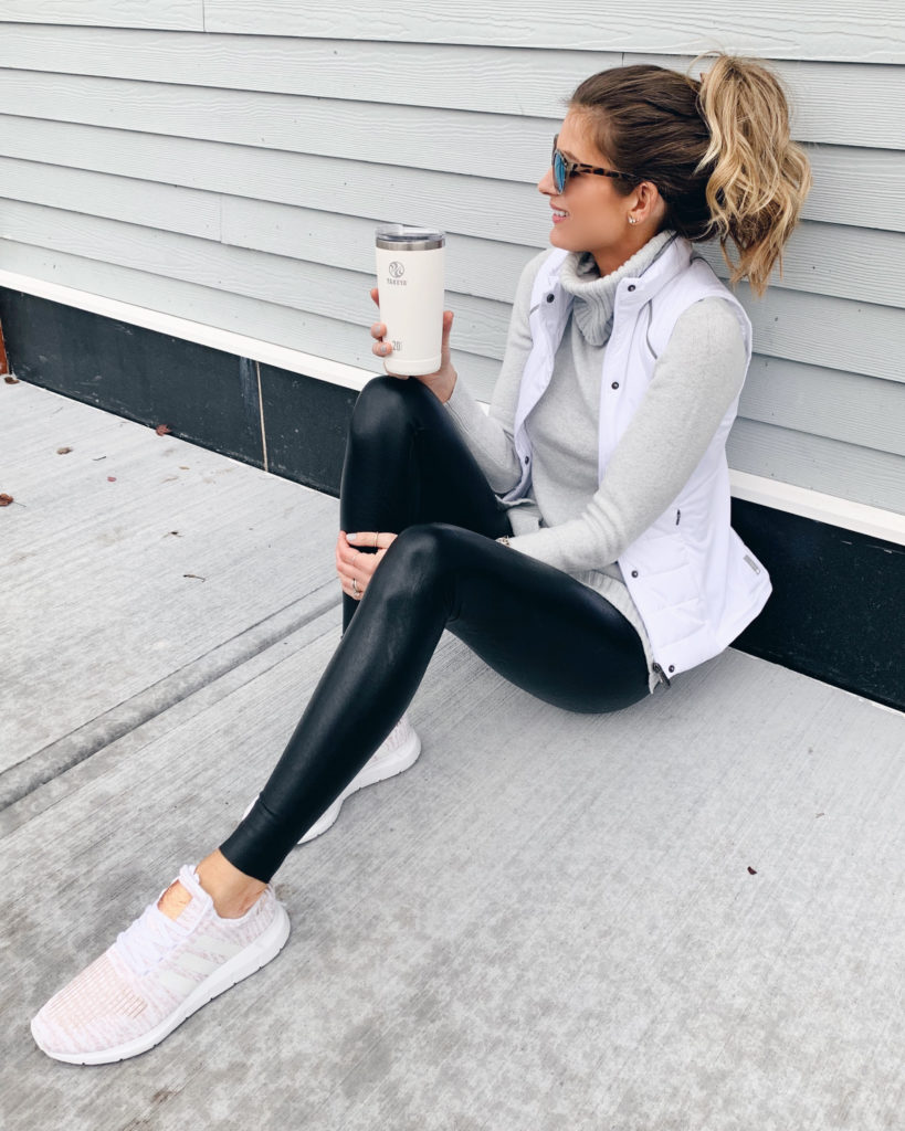 how to wear black faux leather leggings with casual athleisure wear 