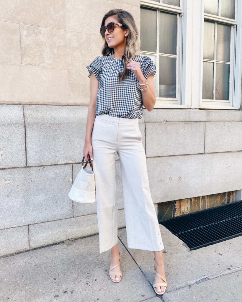 Ann Taylor navy and white gingham pleated flutter sleeve top with cream wide leg crop pants 