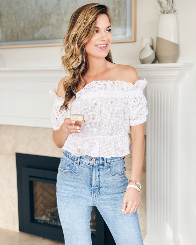 express cropped white off the shoulder ruffle eyelet lace top with super high waisted light wash ankle jeans