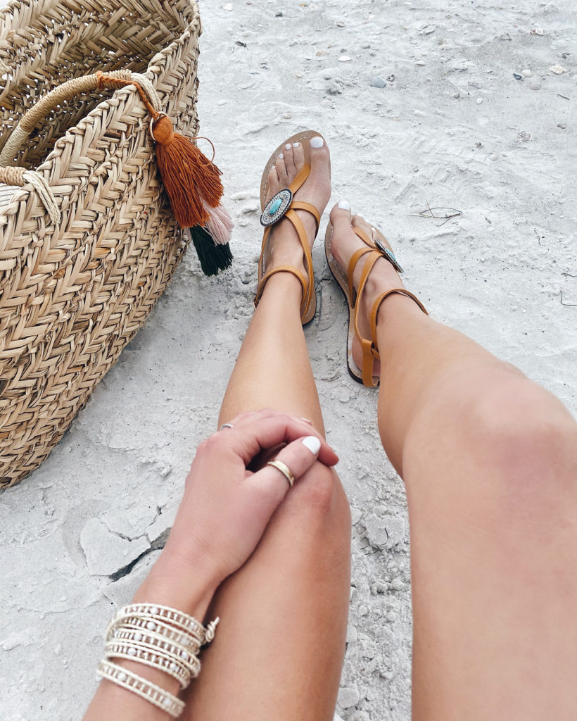 beach accessories - straw tassel tote, embellished amazon sandals and victoria emerson wrap bracelet