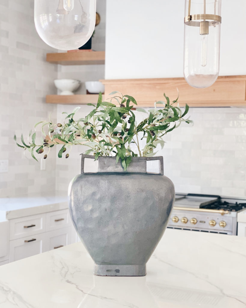 kitchen home decor - large ceramic vase with faux olive tree branches