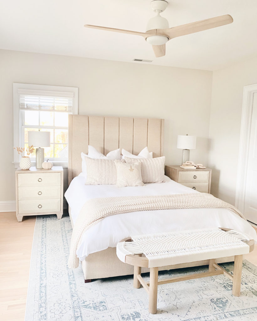 neutral guest bedroom with coastal style decor