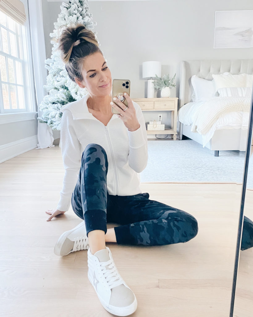white zip up jacket with camo joggers and high top sneakers - walmart cute athleisure outfit