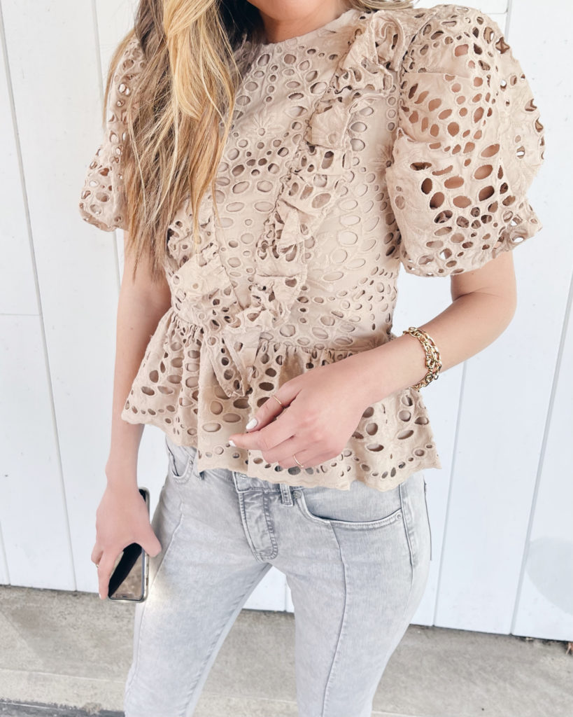 beige eyelet lace puff sleeve ruffle peplum top for spring happy hour outfit