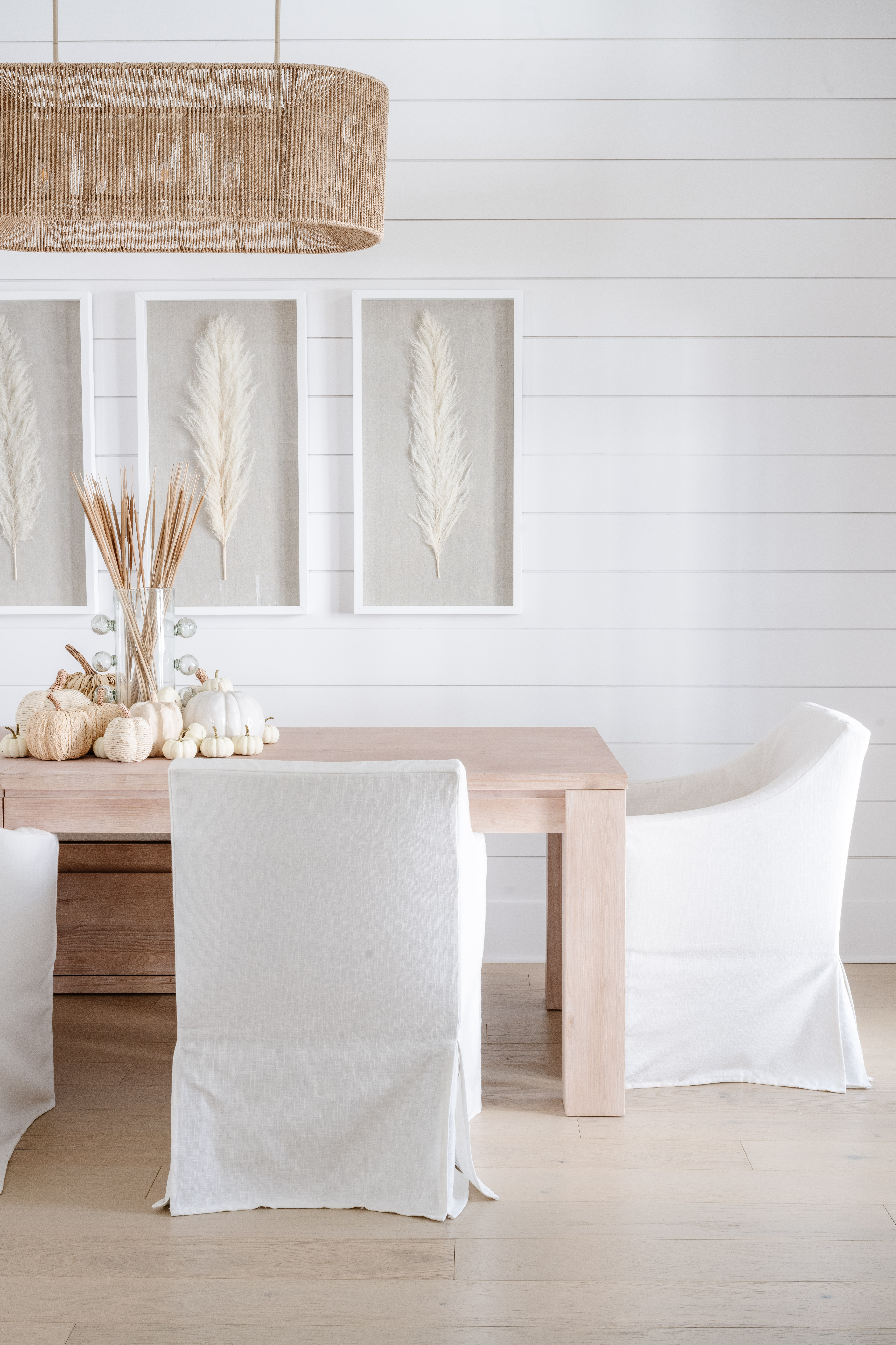 modern coastal dining table with slipcover chairs