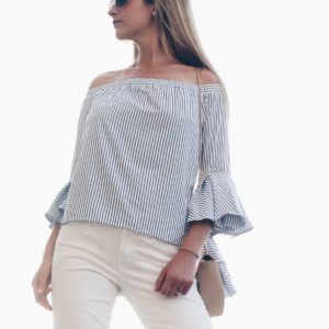 striped off the shoulder top with bell sleeves paired with white wide leg denim