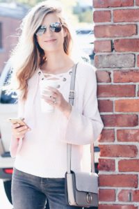 pink bell sleeve sweater and chloe dupe bag