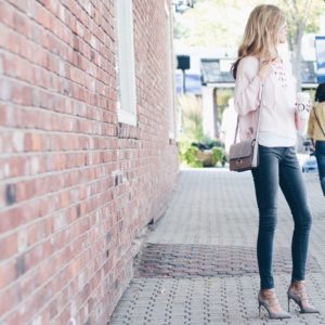 pink sweater and gray denim