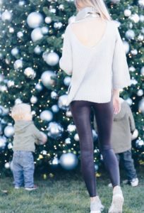 athleisure outfit - open back knit sweater with leather leggings