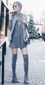 christmas outfit: fur vest over dress and over the knee boots