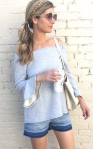 summer outfit ideas - off the shoulder bell sleeve sweatshirt with denim cuttoffs