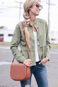 nordstrom anniversary sale outwear favorites of pinterestingplans. rachel moore is wearing a peplum utility jacket and lace cami with a sole society cognac corssbody bag