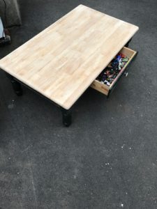 farmhouse coffee table makeover - the before pic of the coffee table