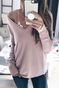 pink fall sweaters - pinterestingplans in slouchy pink knit top over white bralette