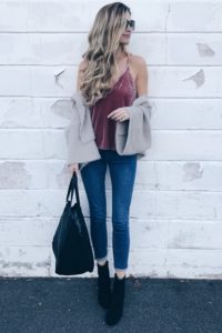 holiday airport outfits - denim leggings and fuzzy cropped cardigan