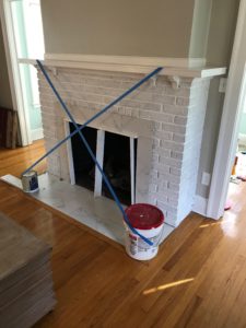 fireplace makeover before and after - tile hearth replaced and updated