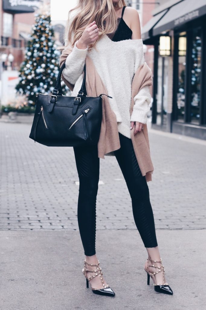 holiday outfits with leggings faux leather moto leggings and rockstud heels with oversized tunic sweater on pinterestingplans
