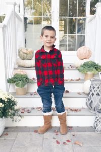 little boy wearing fall outfit with koolaburra boots
