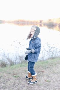 fall layers for the family - young boy in trapper hat n pinteresting plans fashion blog
