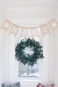holiday mudroom decor - eucalyptus wreath and burlap banner on pinteresting plans blog