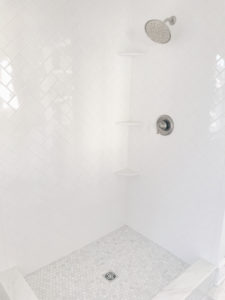 herringbone subway tile in shower and white vanity with tower on pinteresting plans blog
